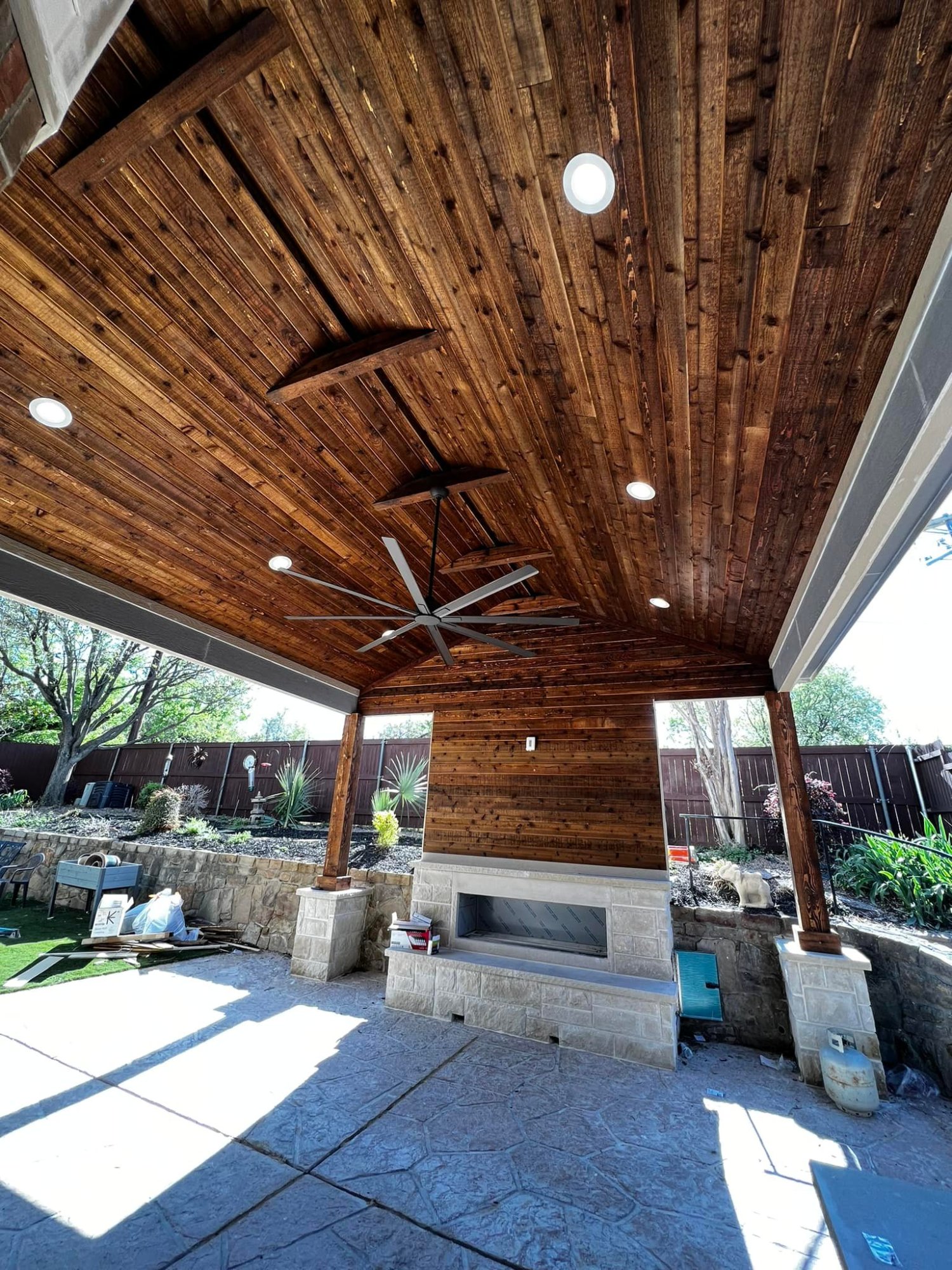 Covered patio with ceiling fan and recessed lighting